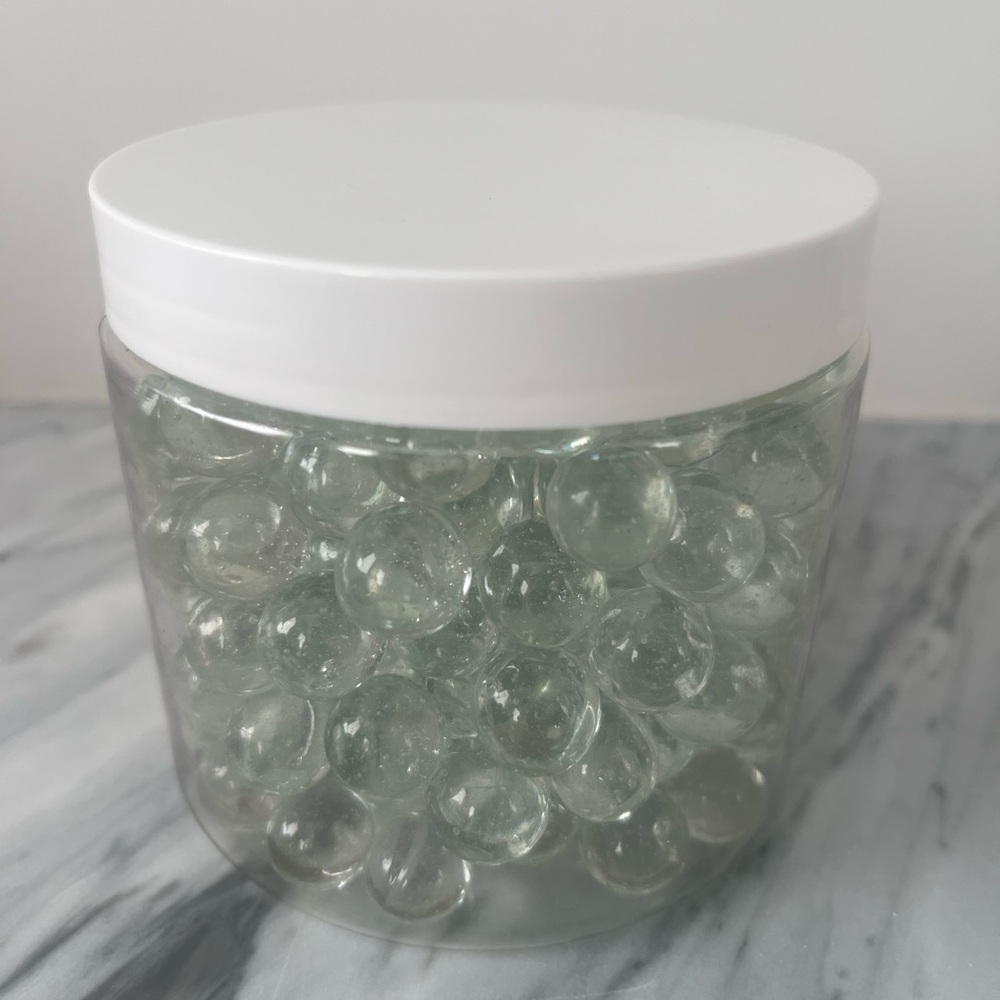Clear Glass Marbles in Jar